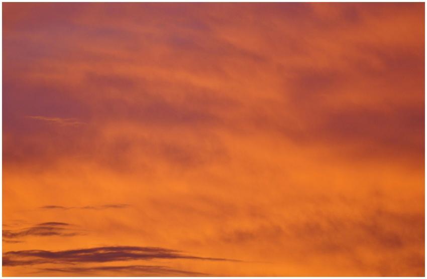 A stunning orange sky captured during a dramatic s