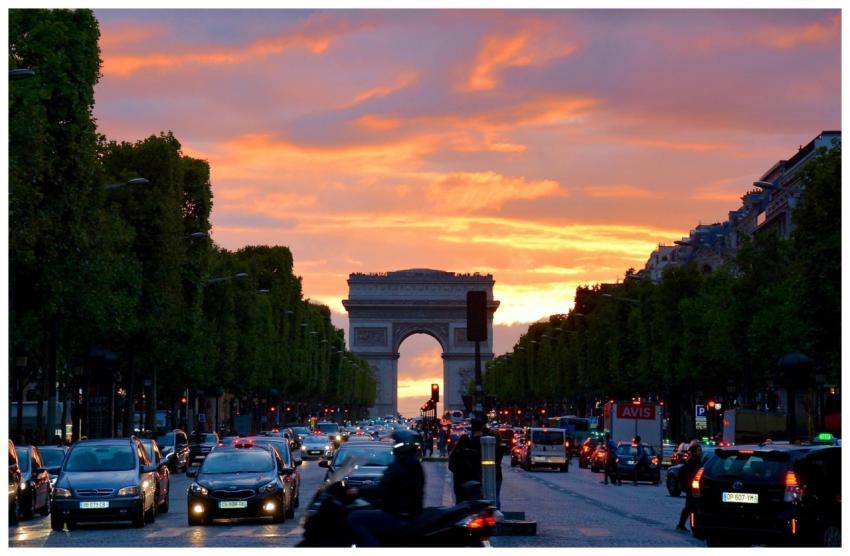 Vivid sunset sky over Arc de Triomphe, capturing P