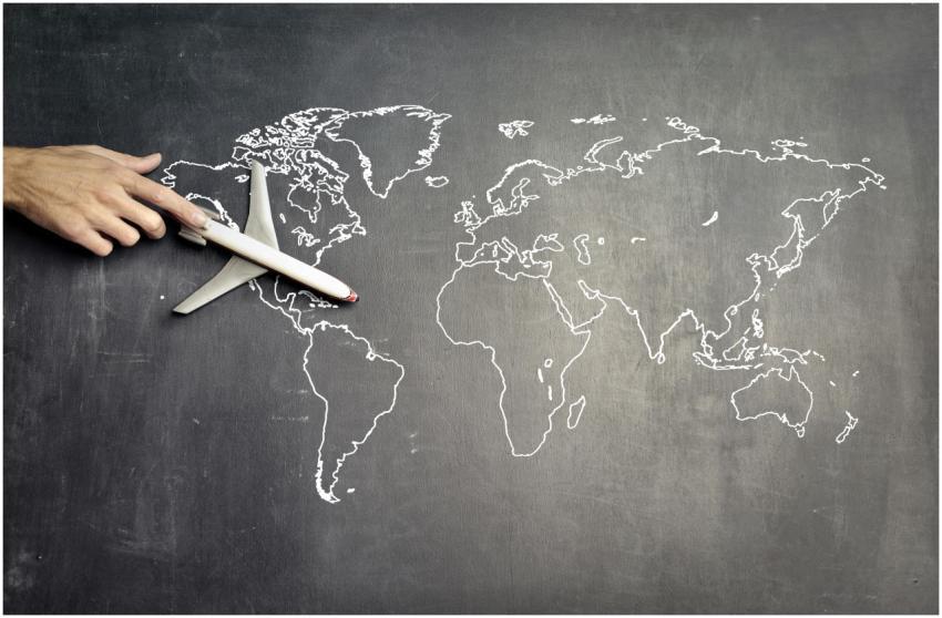 From above of crop anonymous person driving toy ai