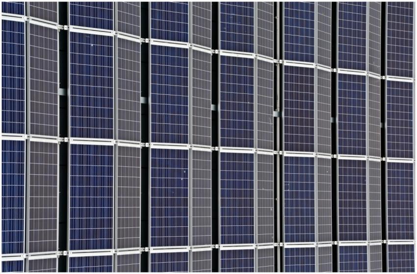Close-up of multiple solar panels representing ren