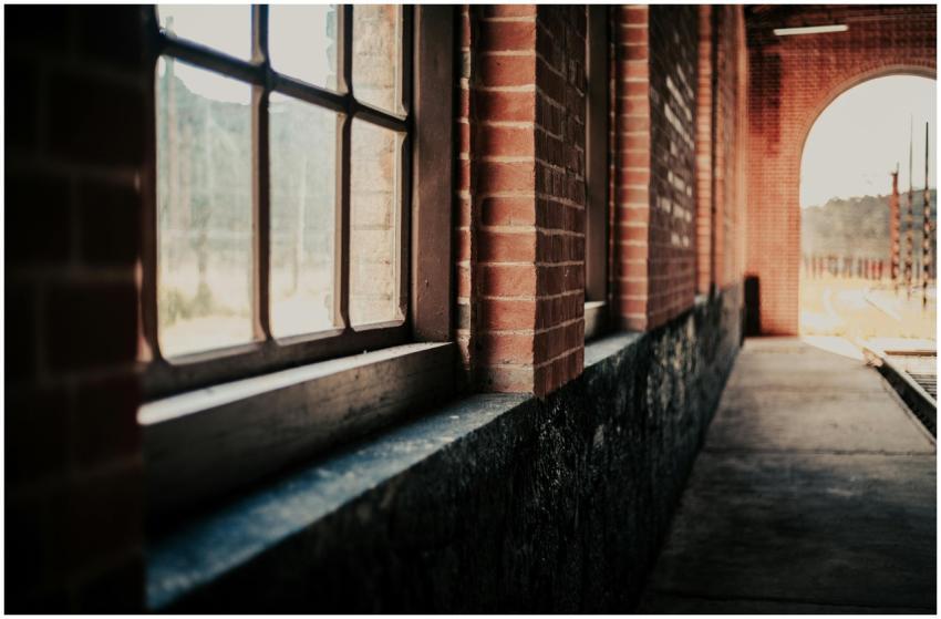 A rustic corridor in a historic train station with