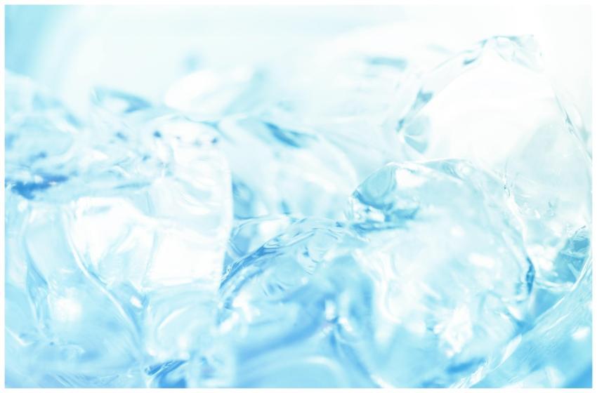 Abstract close-up of ice cubes against a bright bl