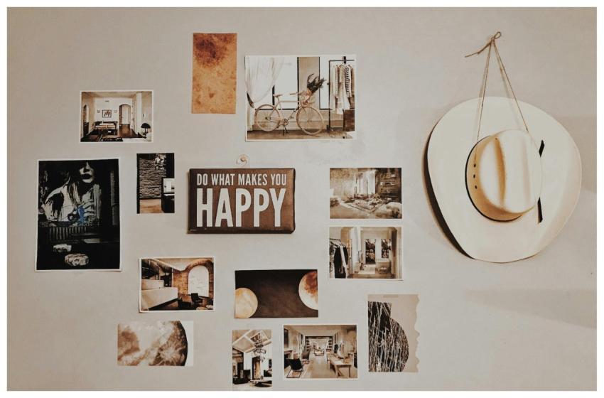 Gallery wall with photos, art, and an inspirationa