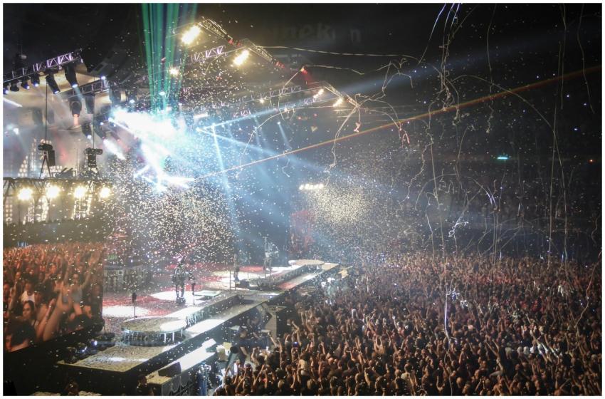 Vibrant concert scene with dynamic lighting, confe