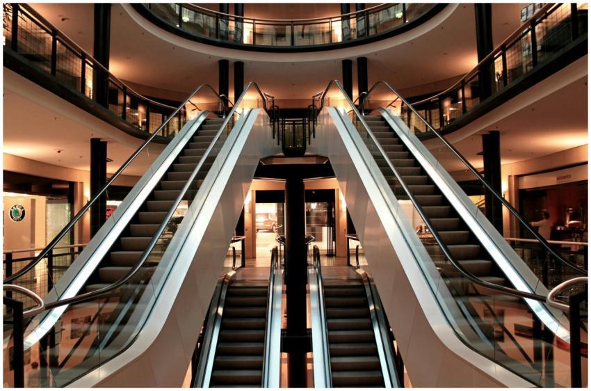 Symmetrical view of escalators in a modern shoppin
