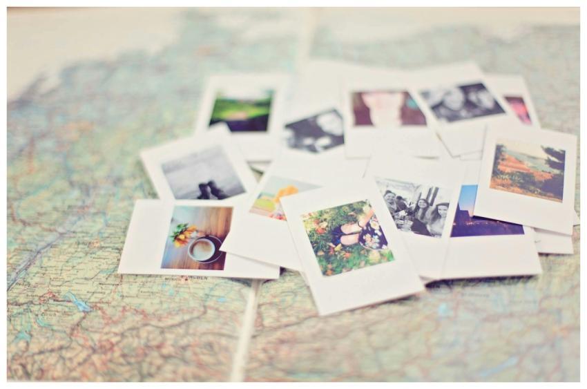 A collection of Polaroid memories spread across a