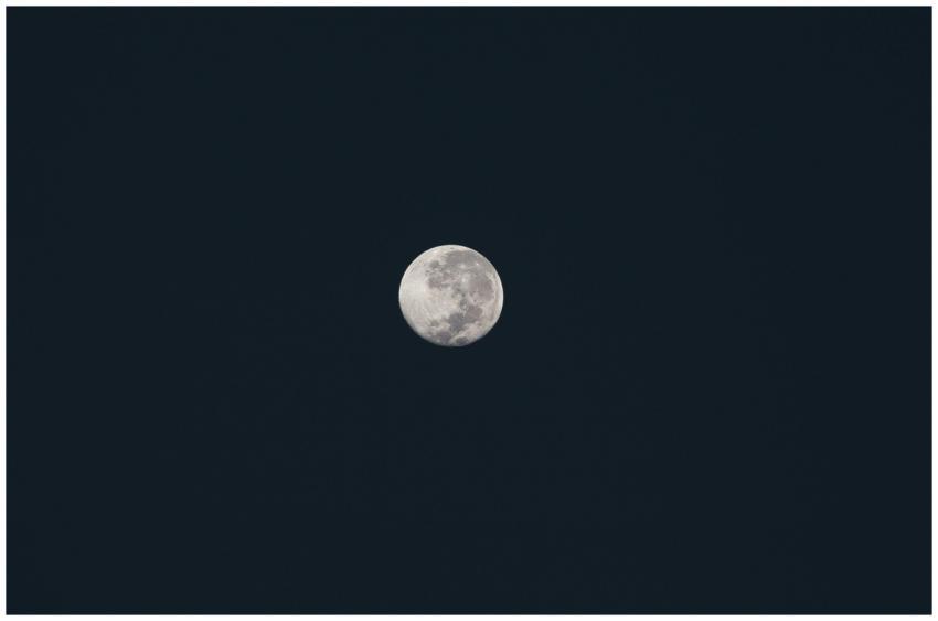 A stunning full moon captured against a dark night