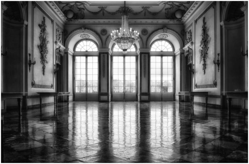 Black and white photo of a baroque interior with a