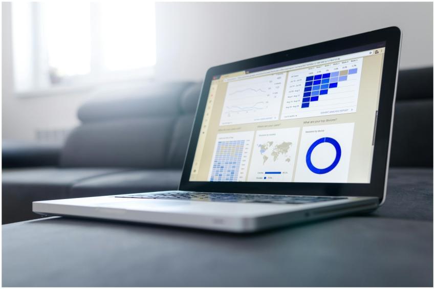 Sleek laptop showcasing data analytics and graphs
