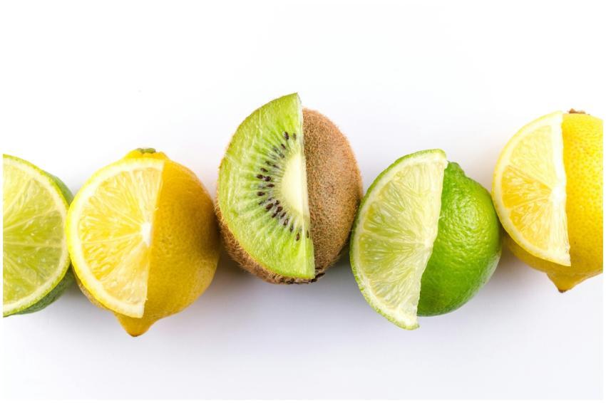 Colorful arrangement of kiwi, lemon, and lime slic