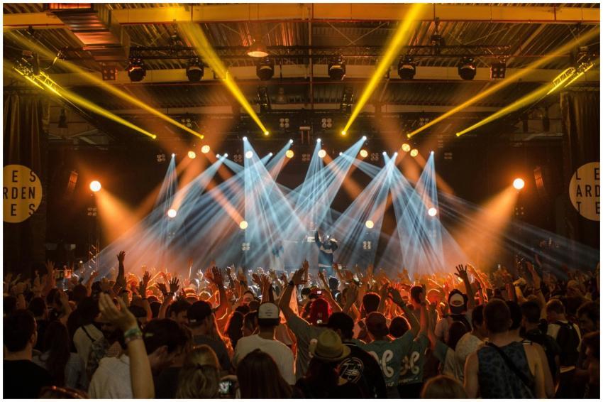 Energetic music concert scene with bright lights a