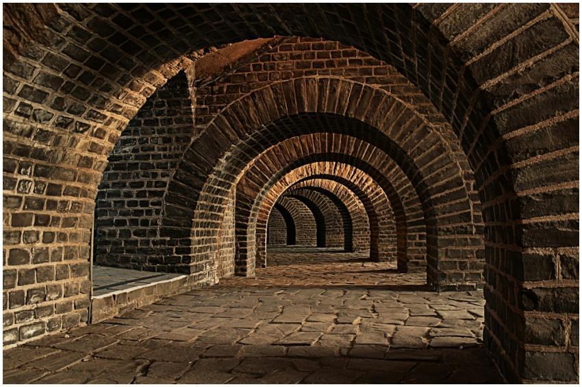 Explore the timeless beauty of a stone archway in