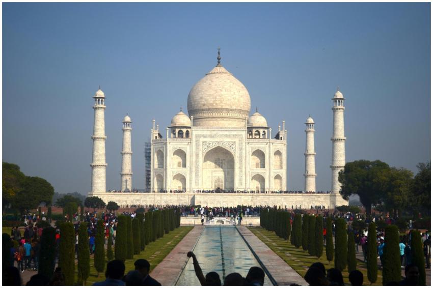 Iconic view of the Taj Mahal with tourists in Agra