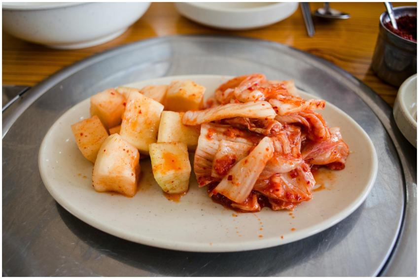 Close-up of traditional Korean kimchi and cubed ra
