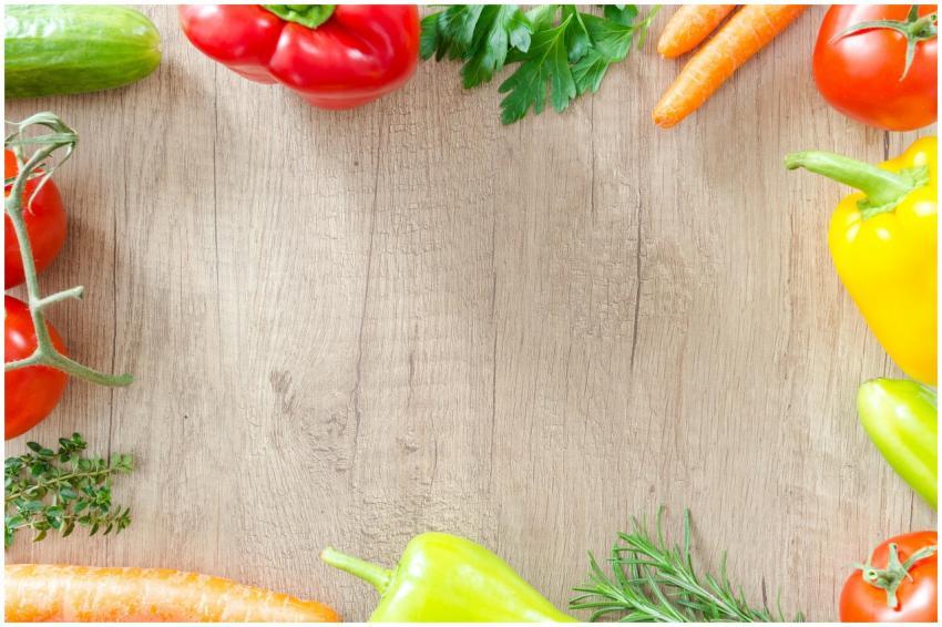 A top view of various fresh organic vegetables arr