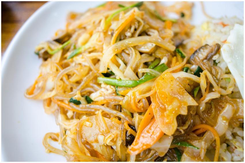 Appetizing stir-fried noodles with vegetables on a