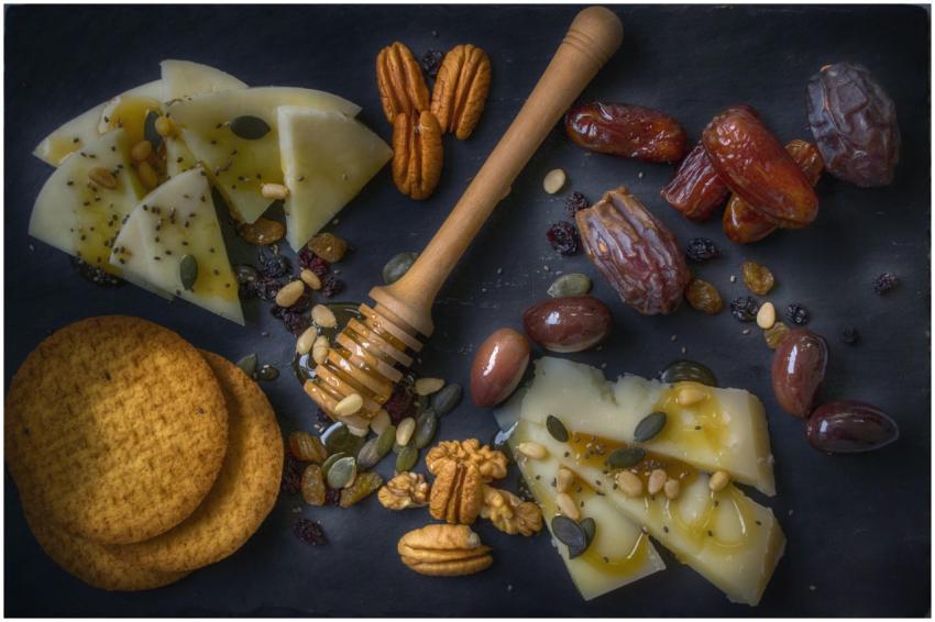 A delightful snack assortment with cheese slices,