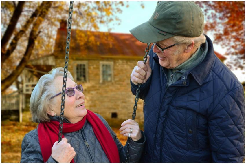 A happy elderly couple sharing a joyful moment on