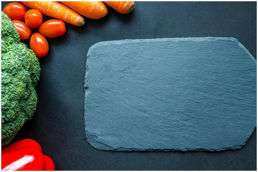 Colorful vegetables on a slate board, perfect for