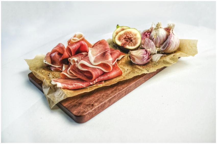 Elegant display of prosciutto, fresh figs, and gar