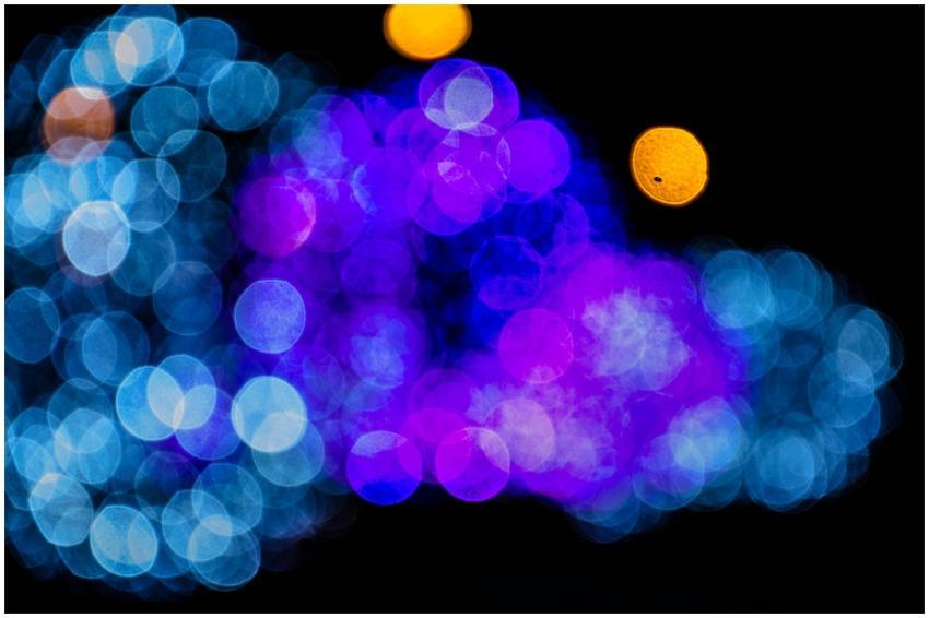 Vibrant abstract image of bokeh lights in blue and