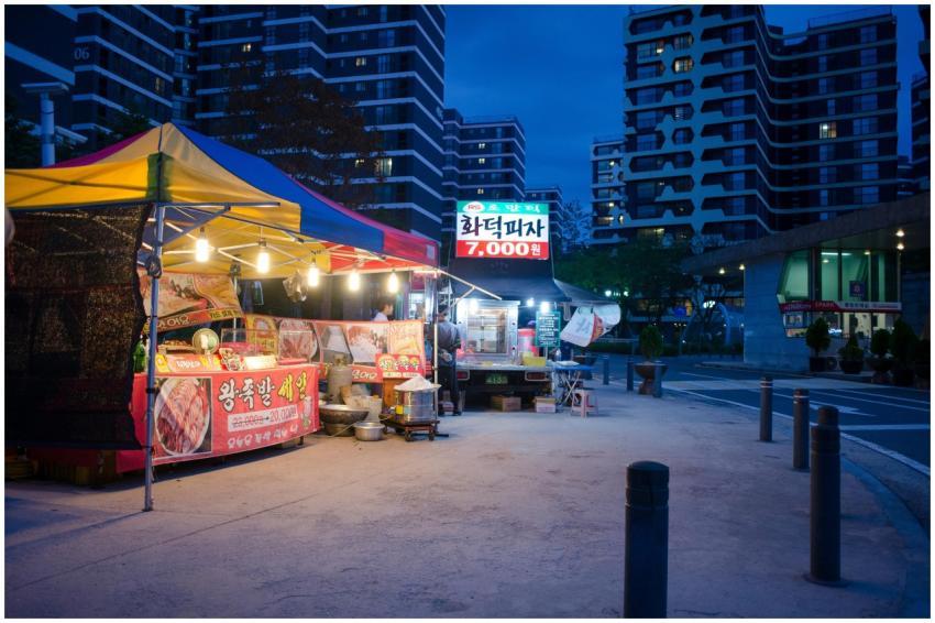 Outdoor street food stall at night in urban citysc