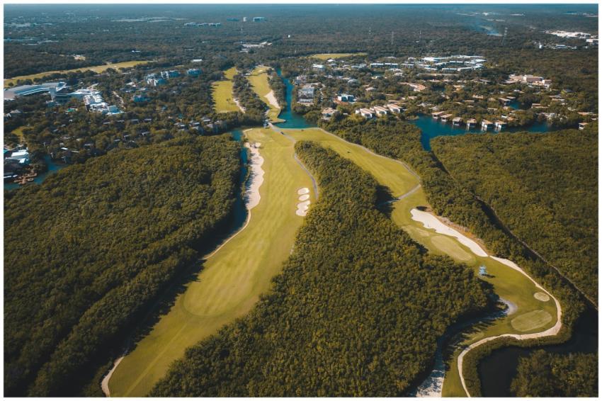A breathtaking aerial shot of a lush golf course s