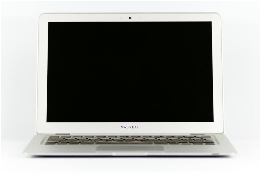 Front view of a MacBook Air laptop with a blank sc