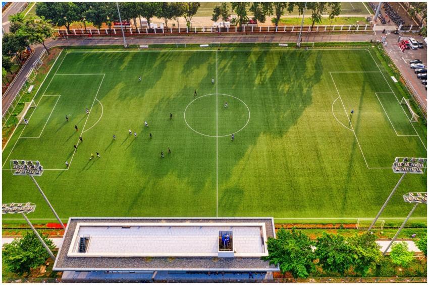 High-angle shot of a soccer game at a stadium in J