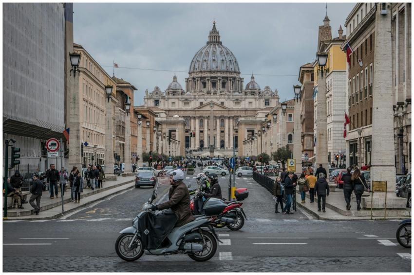 St. Peter's Basilica view with vibrant street life