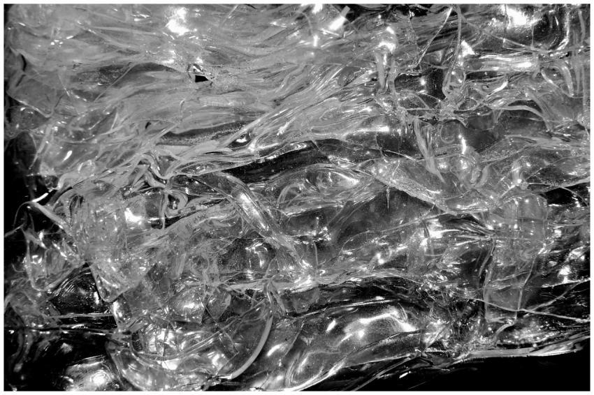 From above of transparent clear shiny crystal plas