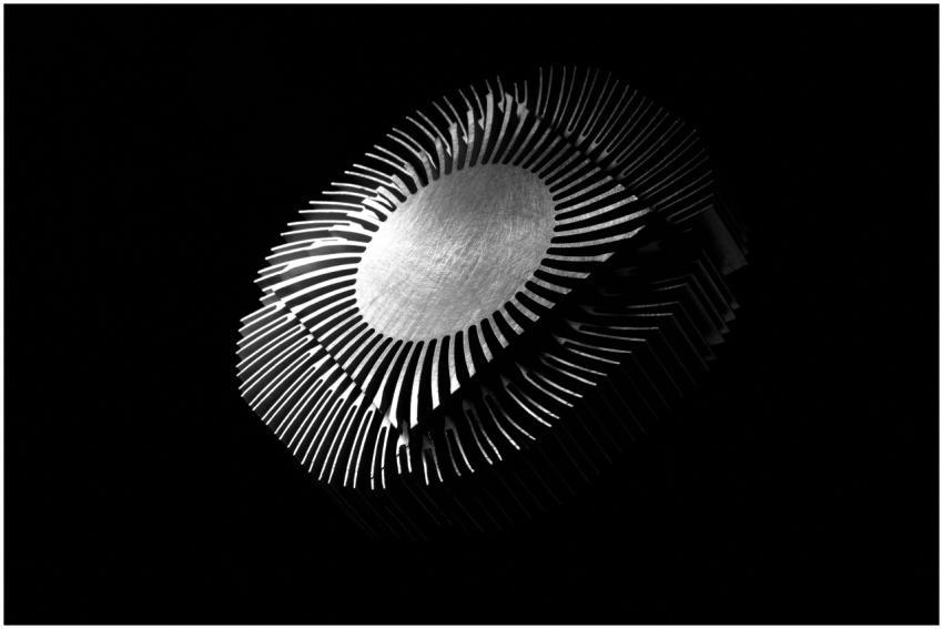 Close-up abstract image of a metallic heat sink wi