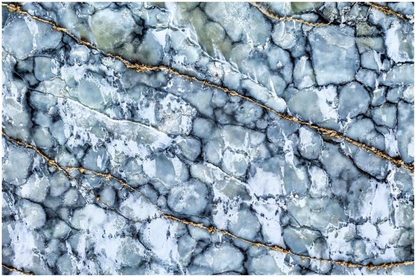 Close-up of an abstract blue ice pattern featuring