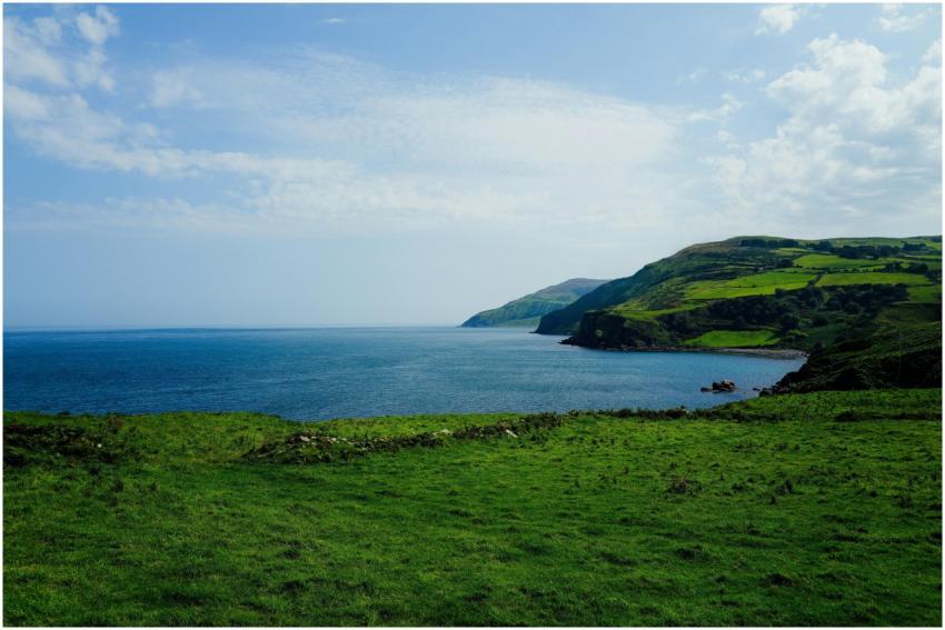 Breathtaking view of rolling green hills meeting t