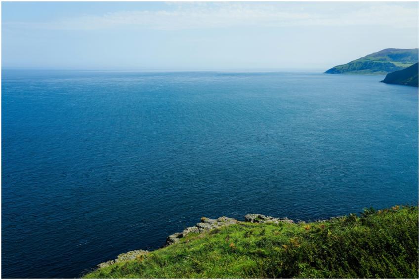 A peaceful coastal scene with expansive ocean view