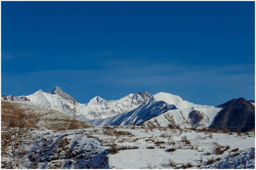 Breathtaking view of snow-covered Caucasus mountai