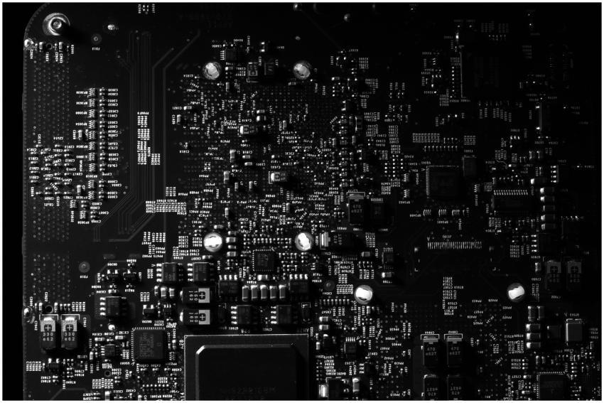Detailed black and white photo of a circuit board