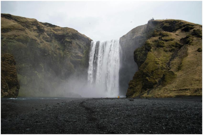 Explore the stunning Skógafoss waterfall in Icelan