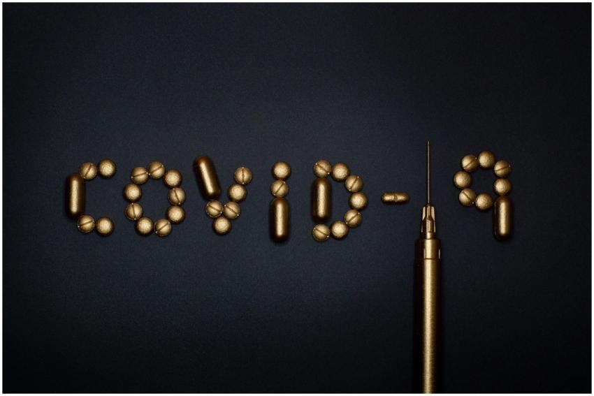 Artistic depiction of COVID-19 using pills and a s