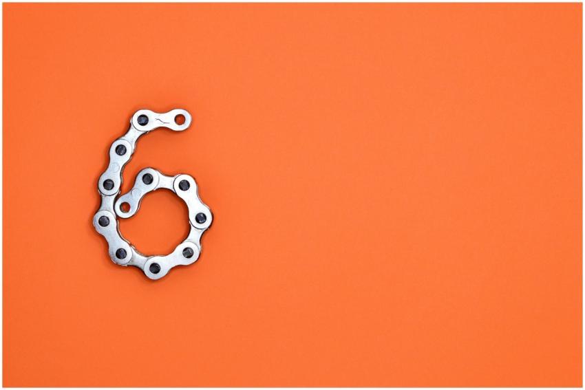 A creative display of a bike chain forming the num