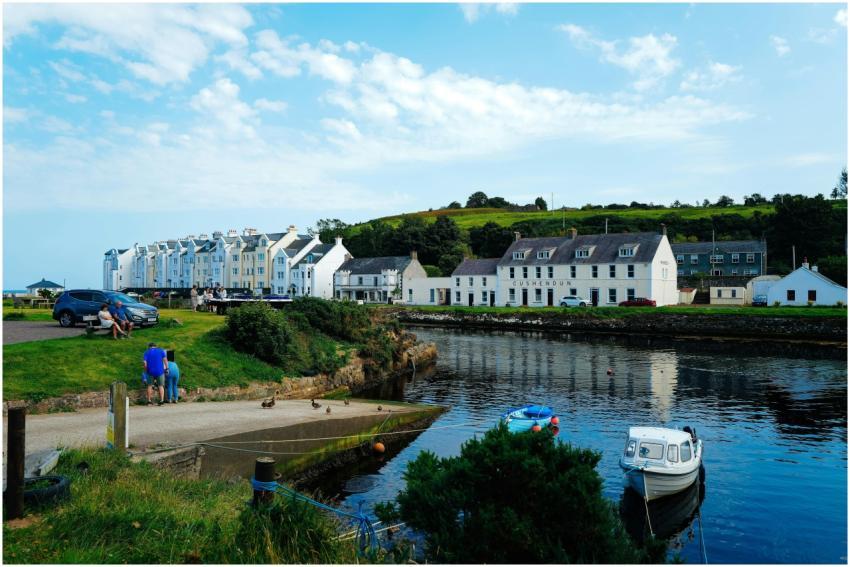 Scenic view of a charming coastal village with boa