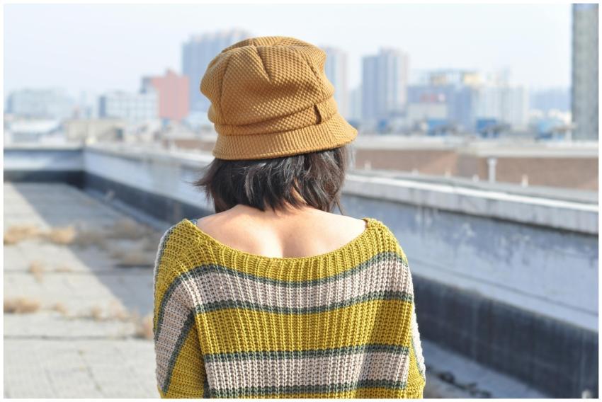 Rear Woman Rooftop Cityscape