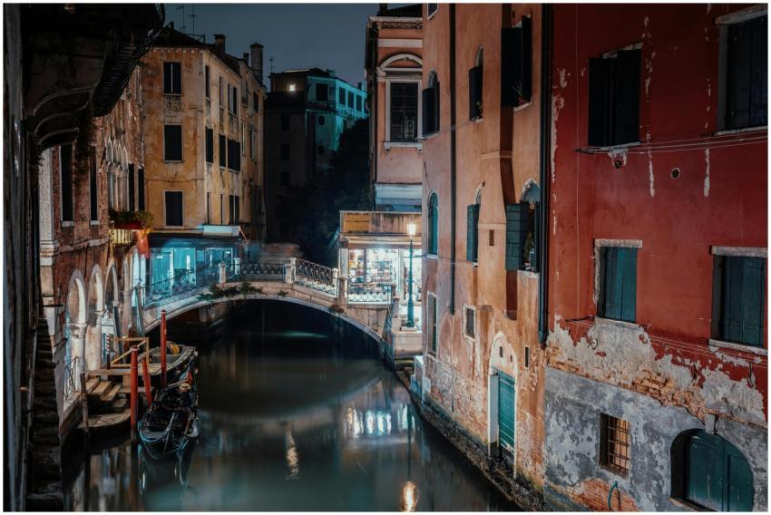 Explore the picturesque Venice canal with its char