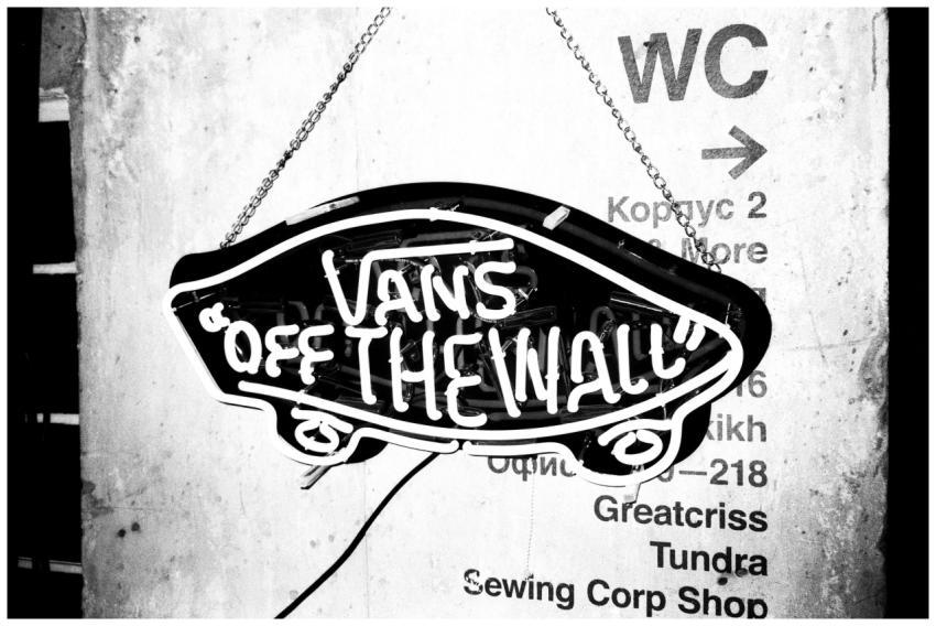 Artistic black and white image of a neon sign with