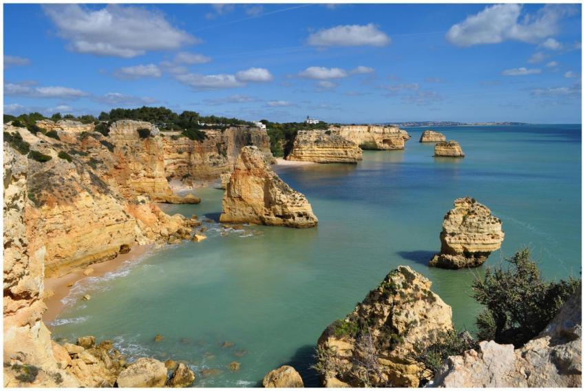 Breathtaking view of Marinha Beach cliffs and turq