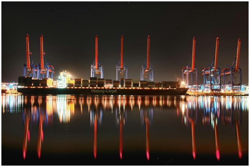 Stunning night view of a container ship docked at