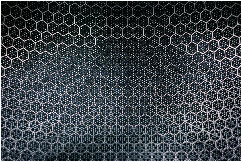 Abstract hexagonal metal pattern with textured sur