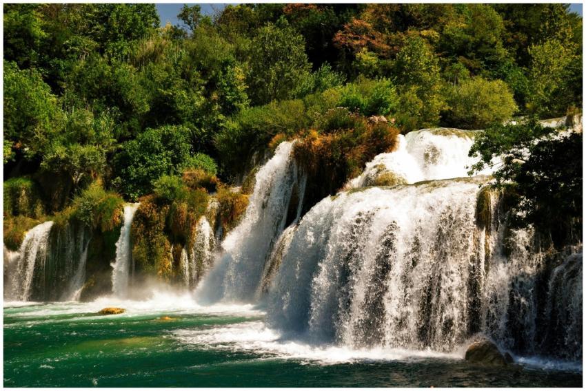 Beautiful cascading waterfalls surrounded by lush