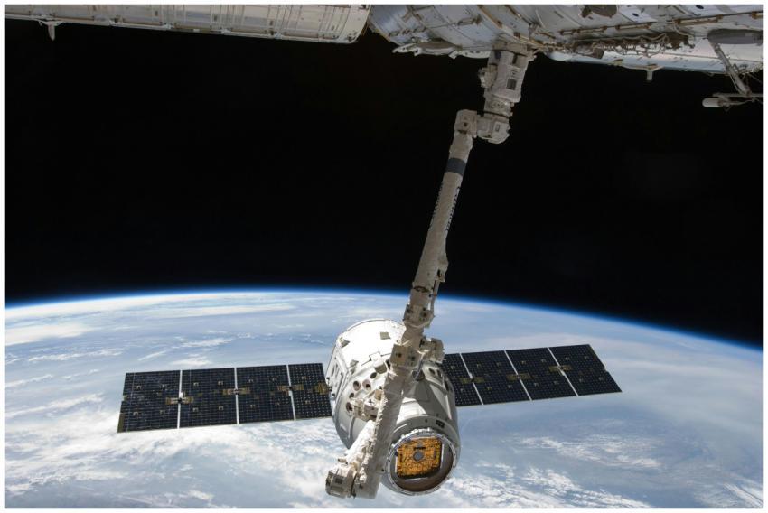 View of a spacecraft docked at the ISS above Earth