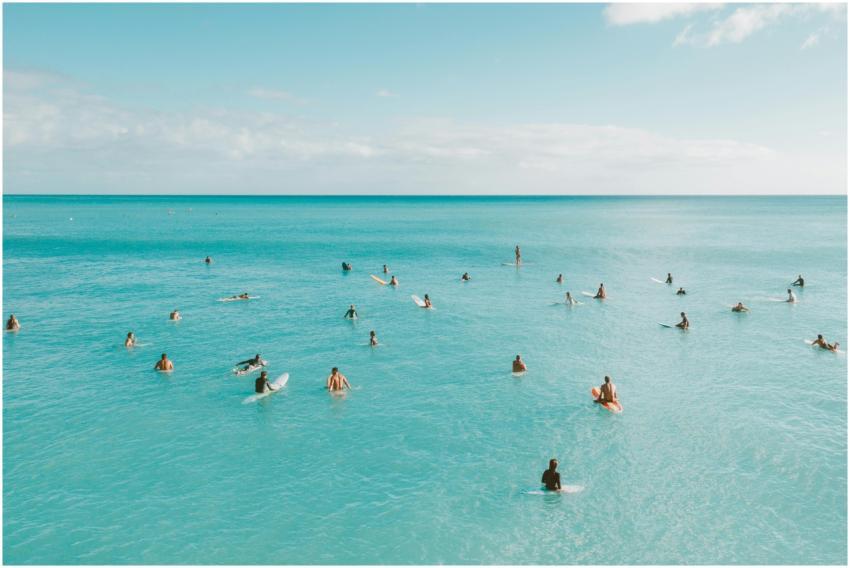 Aerial view of surfers waiting on their boards in
